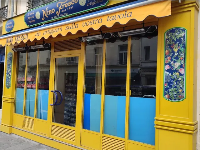 Yellow Nino Fresco storefront at 16 rue Montmartre in Paris